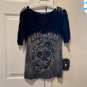 Crash and Burn shirt from Buckle. Cool emblem both sides and lace.